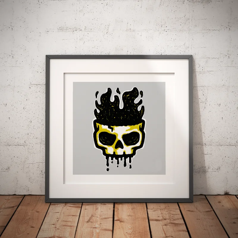 Framed skull artwork with a blue mark along the right side of the frame.